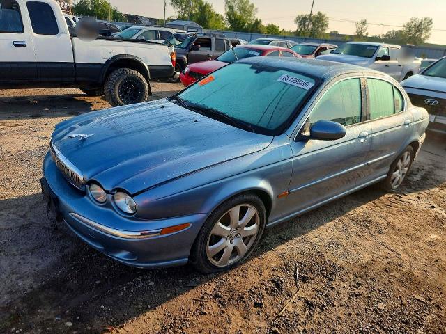 2004 Jaguar X type VIN SAJEA51C24WD95363 COPART salvage auction — WATER/FLOOD, IL - CERTIFICATE OF TITLE, sold $275 on 2026-09-14 (photo 1)