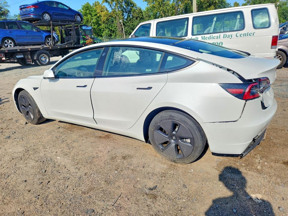 2023 Tesla Model 3 VIN 5YJ3E1EA7PF437687 COPART salvage auction — REAR END, Fl - Certificate Of Destruction, sold $11,600 on 2026-09-22 (photo 2)