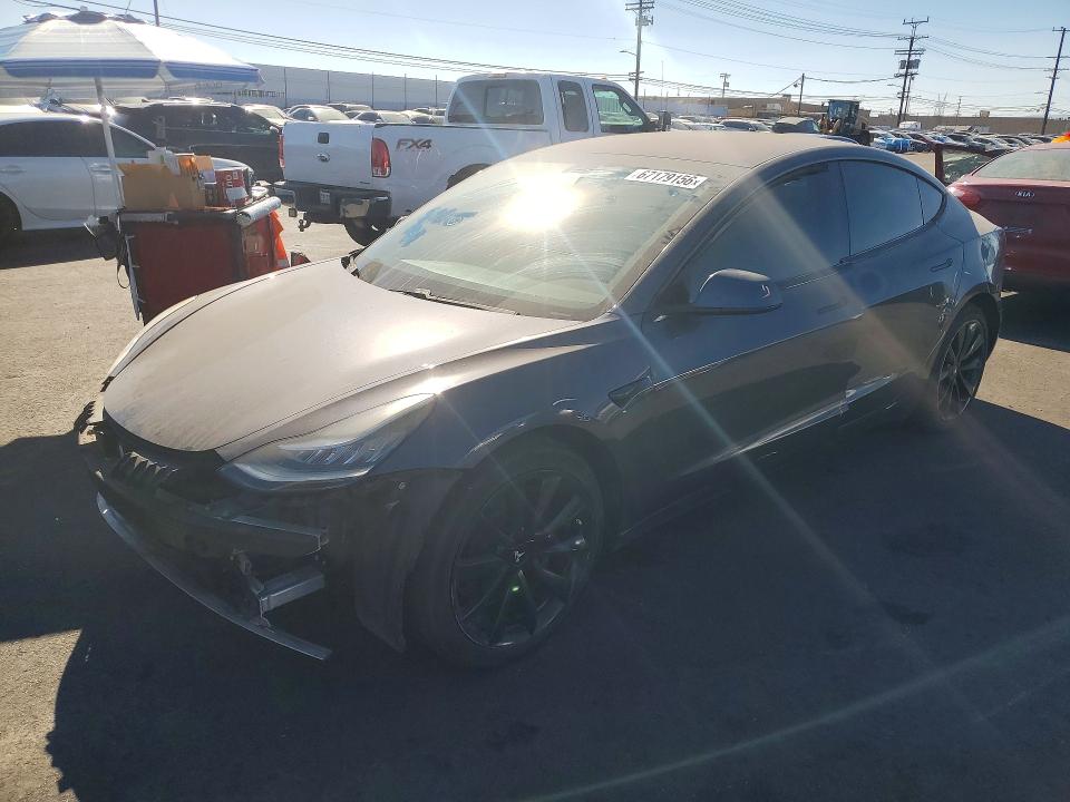 2018 Tesla Model 3 VIN 5YJ3E1EBXJF122334 — COPART salvage auction photo