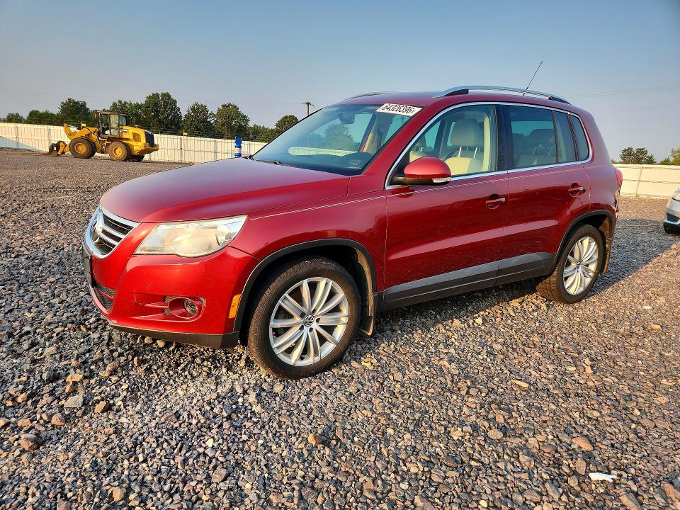 2011 Volkswagen Tiguan VIN WVGBV7AX2BW001063 COPART salvage auction — MINOR DENT/SCRATCHES, MO - CERTIFICATE OF TITLE, sold $700 on 2026-08-12 (photo 1)