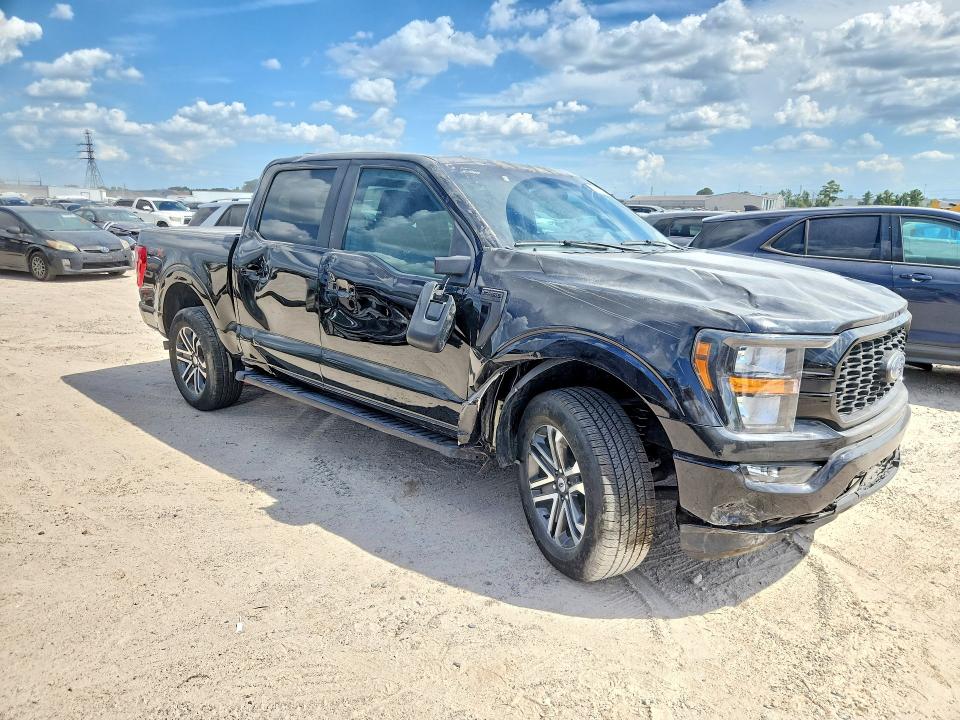 2023 Ford F-150 lightning VIN 1FTEW1C52PKF38909 COPART salvage auction — SIDE, TX - SALVAGE VEHICLE TITLE, sold $13,100 on 2026-08-21 (photo 4)