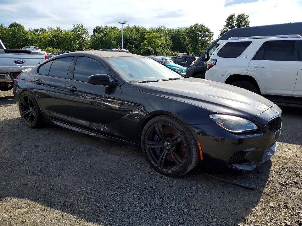 2016 BMW M6 gran coupe VIN WBS6E9C54GG437047 COPART salvage auction — FRONT END, Fl - Certificate Of Title (P), sold $14,700 on 2026-09-15 (photo 4)