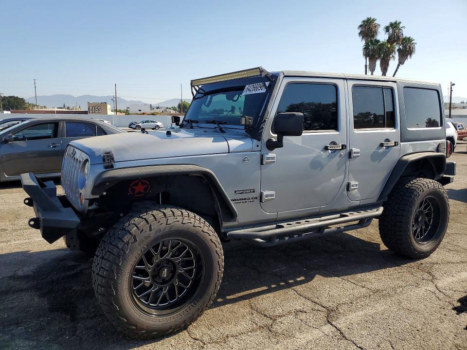 2014 Jeep Wrangler / VIN 1C4HJWDG1EL237368 — COPART salvage auction photo