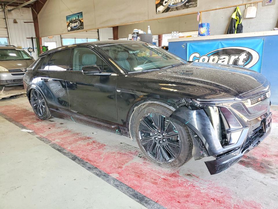 2025 Cadillac Lyriq VIN 1GYKPYRL8SZ314648 COPART salvage auction — FRONT END, Ny - Mv-907A Salvage Certificate, sold $22,200 on 2026-08-17 (photo 4)