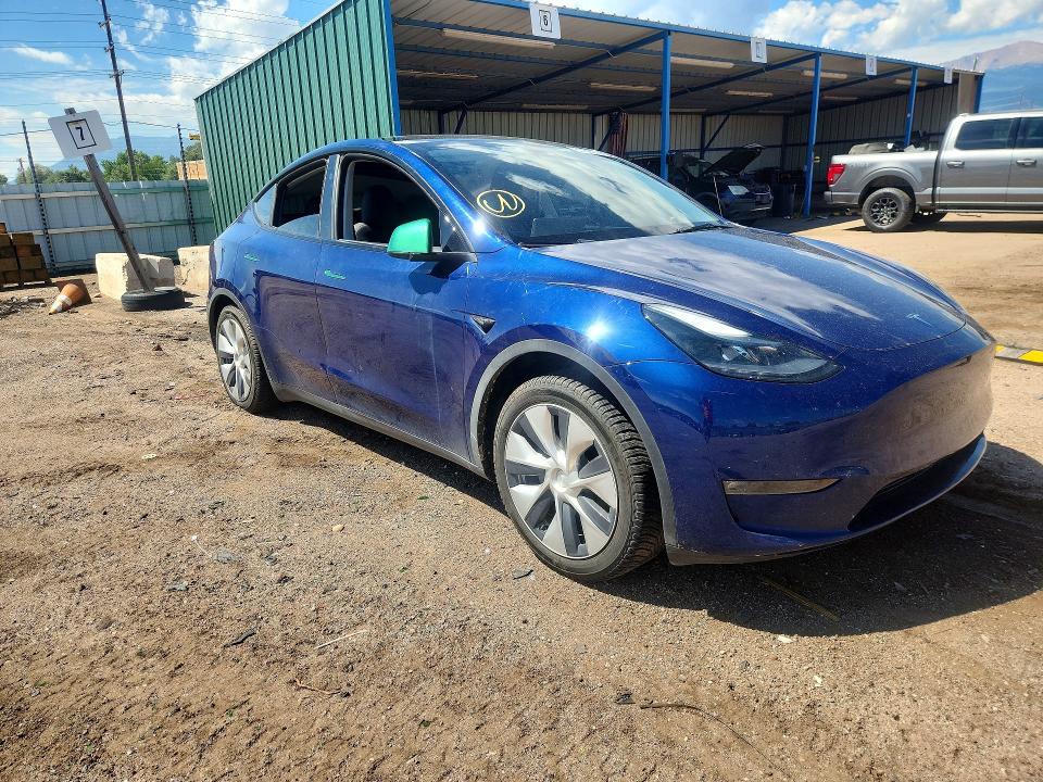 2023 Tesla Model y VIN 7SAYGDEE8PF863637 COPART salvage auction — ALL OVER, CO - SALVAGE TITLE, sold $7,100 on 2026-09-04 (photo 4)
