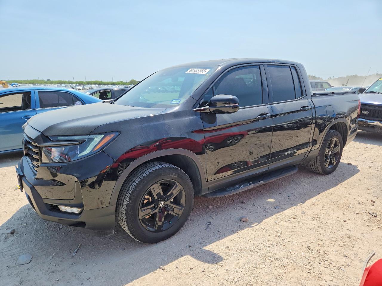 2023 Honda Ridgeline VIN 5FPYK3F82PB016280 — COPART salvage auction photo