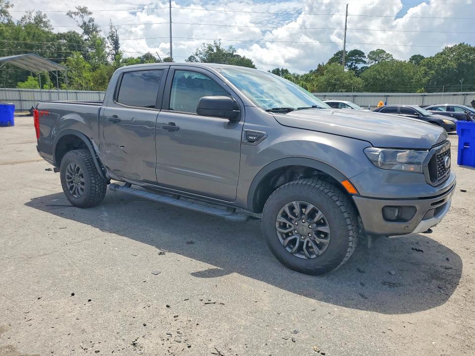 2023 Ford Ranger VIN 1FTER4EH2PLE16206 COPART salvage auction — SIDE, Salvage Title, sold $7,600 on 2026-08-20 (photo 4)
