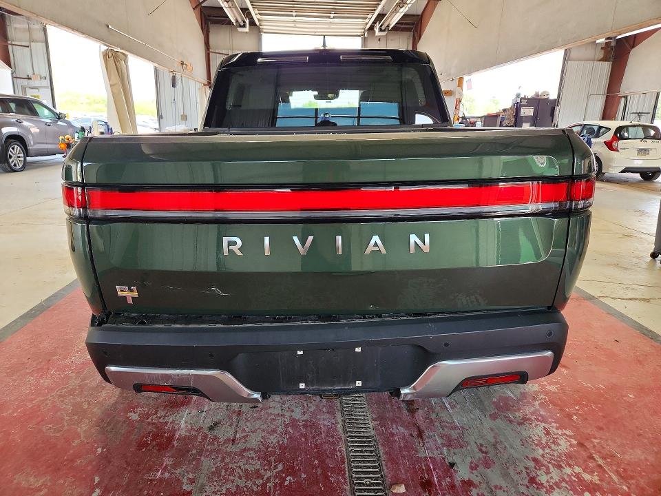 2022 Rivian R1t VIN 7FCTGAAA2NN011916 COPART salvage auction — SIDE, NY - MV-907A SALVAGE CERTIFICATE, sold $13,300 on 2026-09-04 (photo 6)