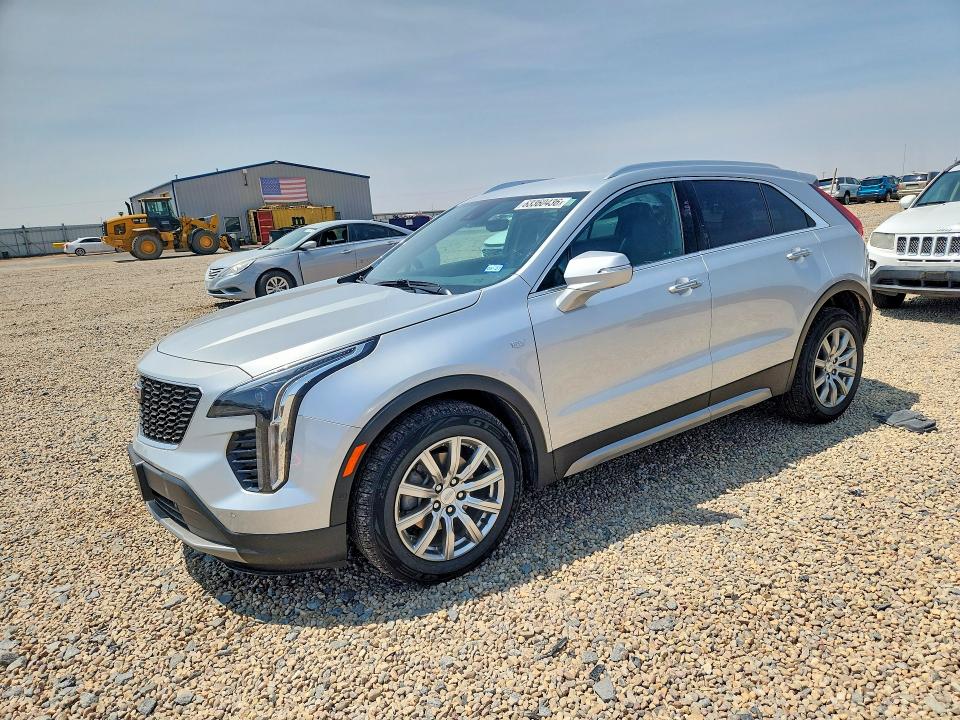 2022 Cadillac Xt4 VIN 1GYFZCR45NF137988 COPART salvage auction — SIDE, Tx - Salvage Vehicle Title, sold $8,700 on 2026-08-11 (photo 1)