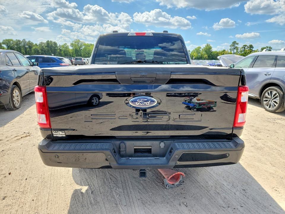 2023 Ford F-150 lightning VIN 1FTEW1C52PKF38909 COPART salvage auction — SIDE, TX - SALVAGE VEHICLE TITLE, sold $13,100 on 2026-08-21 (photo 6)