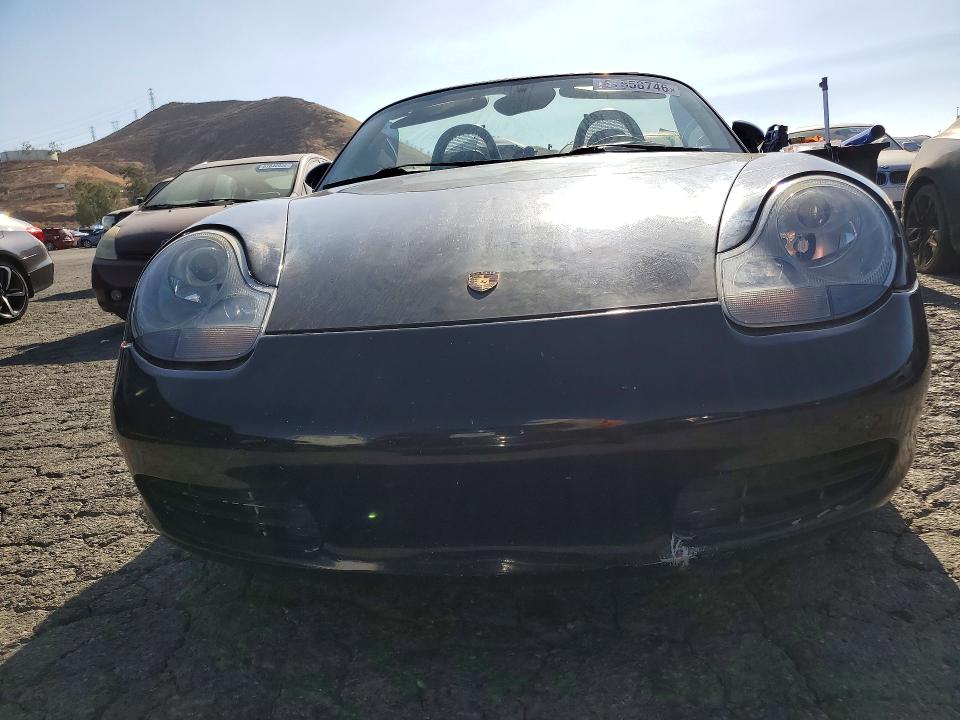 1999 Porsche Boxster VIN WP0CA2986XU628095 COPART salvage auction — MINOR DENT/SCRATCHES, CA - DIS/DLR/EXP ONLY CLEAN TITLE, sold $950 on 2026-09-21 (photo 5)