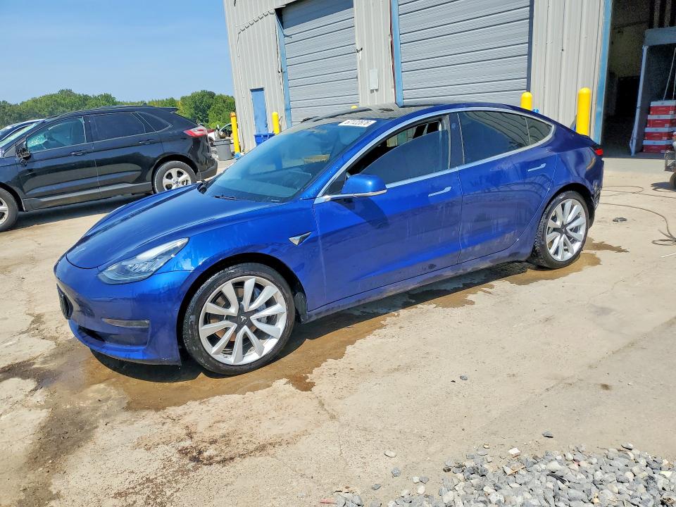 2019 Tesla Model 3 VIN 5YJ3E1EB8KF437666 — COPART salvage auction photo