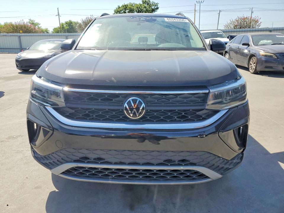 2024 Volkswagen Taos VIN 3VV5X7B23RM105314 COPART salvage auction — SIDE, Tx - Certificate Of Title (P), sold $7,300 on 2026-08-24 (photo 5)