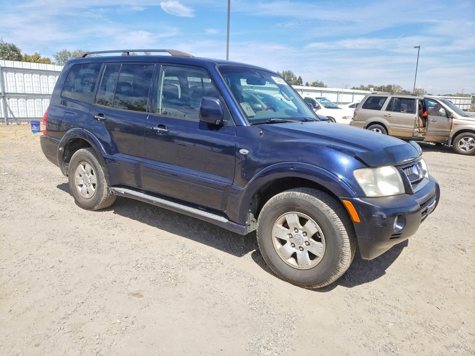 2004 Mitsubishi Montero VIN JA4MW51S64J010572 COPART salvage auction — SIDE, CA - DIS/DLR/EXP ONLY CLEAN TITLE, sold $1,100 on 2026-09-08 (photo 4)