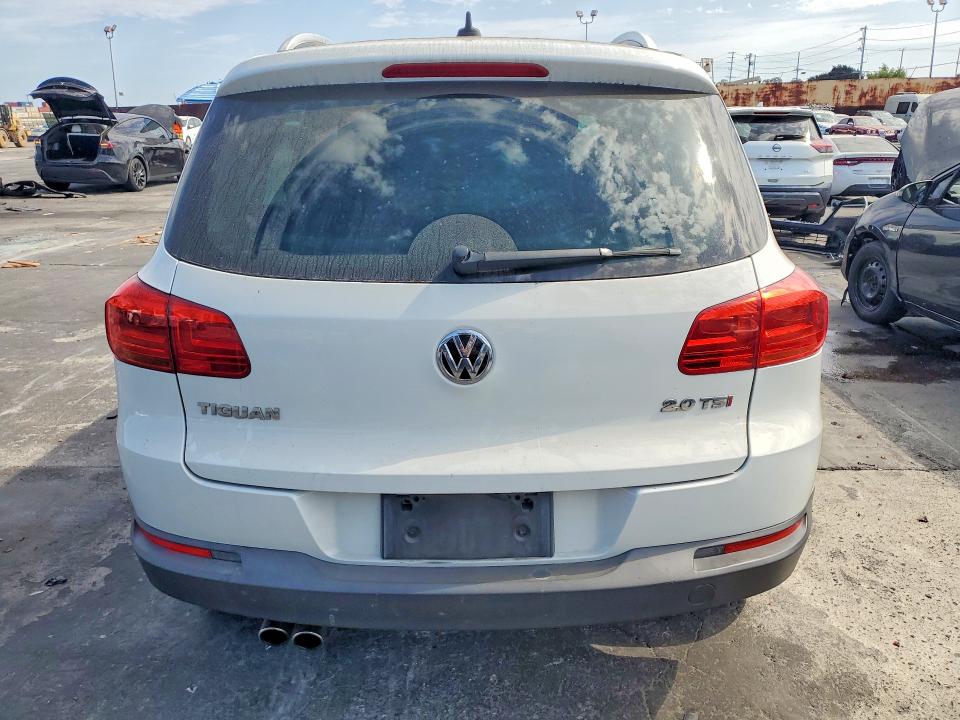2014 Volkswagen Tiguan VIN WVGAV3AX4EW560199 COPART salvage auction — SIDE, Ca - Salvage Certificate, sold $1,450 on 2026-08-19 (photo 6)