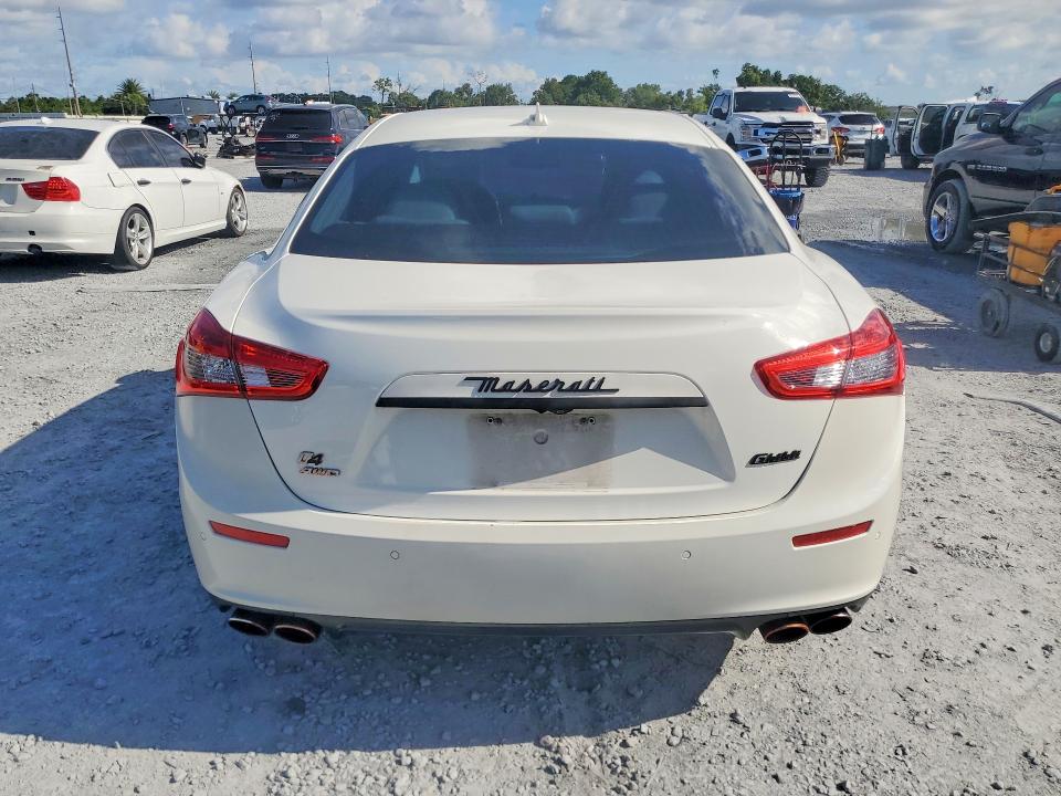 2014 Maserati Ghibli VIN ZAM57RTA3E1094737 COPART salvage auction — MECHANICAL, Fl - Certificate Of Title, sold $1,600 on 2026-08-27 (photo 6)