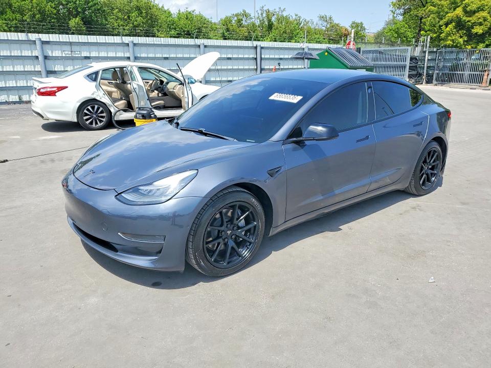 2021 Tesla Model 3 VIN 5YJ3E1EA8MF854022 COPART salvage auction — MINOR DENT/SCRATCHES, Fl - Cert Of Title-Rebuilt, sold $8,600 on 2026-09-09 (photo 1)