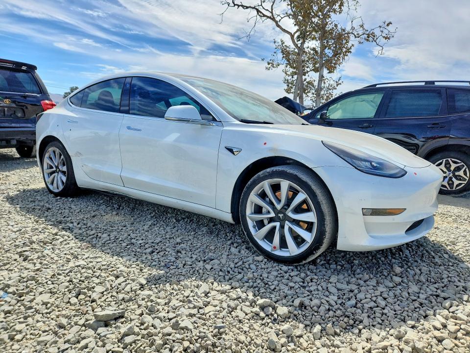 2017 Tesla Model 3 VIN 5YJ3E1EA3HF002053 COPART salvage auction — SIDE, Ca - Salvage Certificate, sold $6,900 on 2026-09-08 (photo 4)