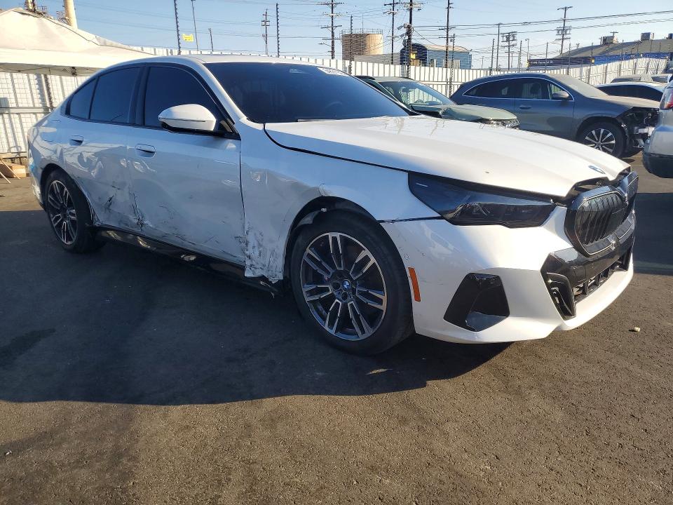 2024 BMW 5er VIN WBA43FJ05RCS99097 COPART salvage auction — SIDE, Ca - Dis/Dlr/Exp Clean W/Salv Hist, sold $28,750 on 2026-08-17 (photo 4)