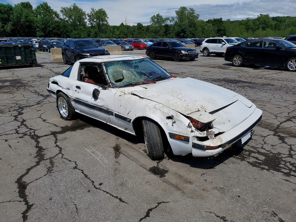 1984 Mazda Rx-7 VIN JM1FB3310E0837784 COPART salvage auction — SIDE, NY - MV-907A SALVAGE CERTIFICATE, sold $3,450 on 2026-08-13 (photo 4)