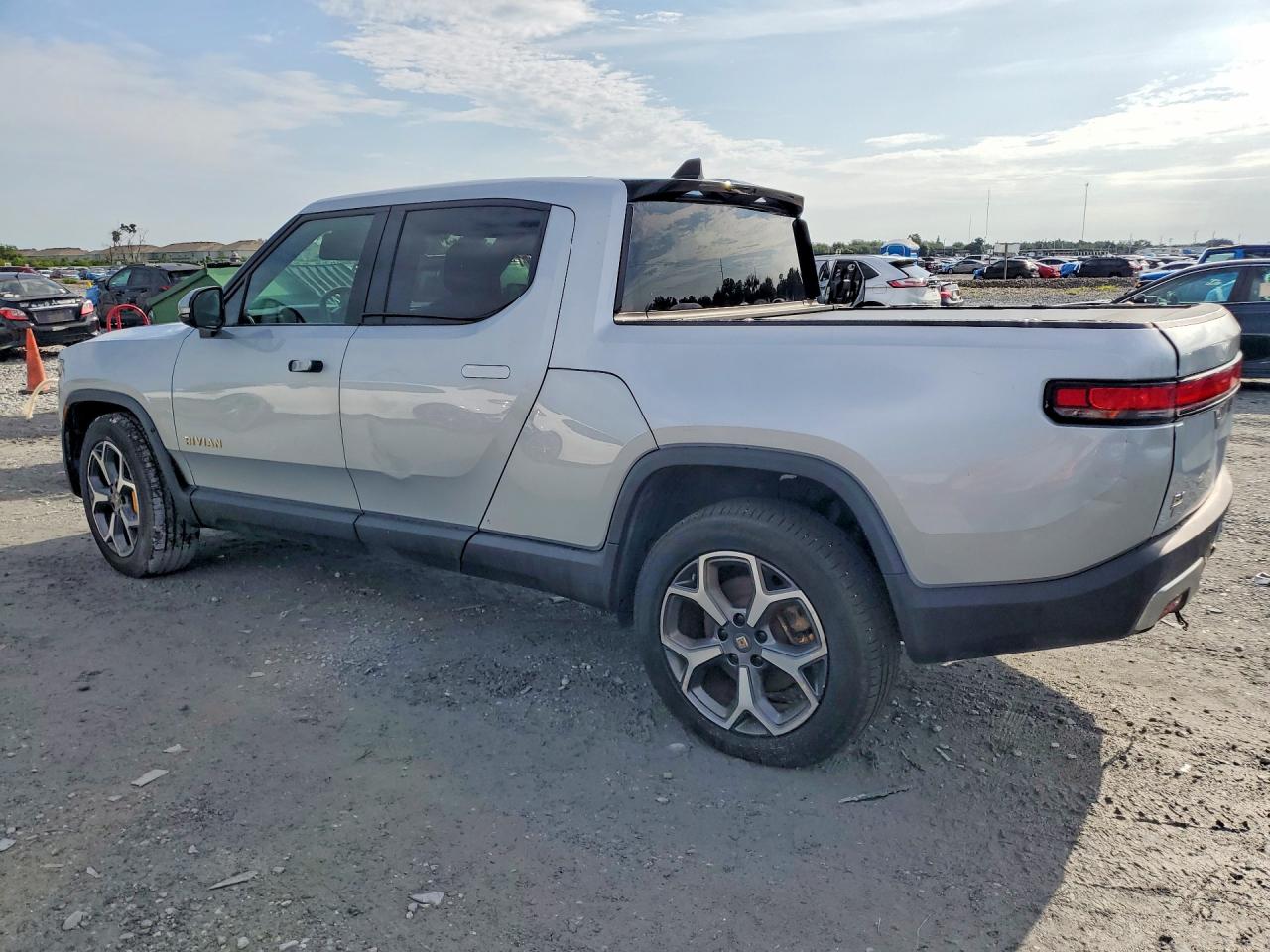 2022 Rivian R1T VIN 7FCTGAAAXNN008066 COPART salvage auction — Rear End, VT - CERTIFICATE OF TITLE, sold $34,500 on 2026-09-11 (photo 2)