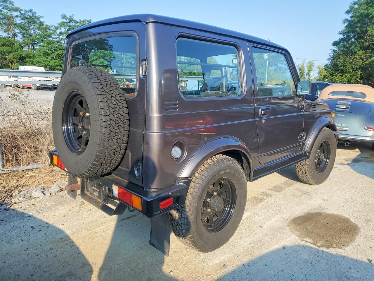 1986 Suzuki Samurai VIN JS3JC51V8G4110639 COPART salvage auction — Water/Flood, FL - CERT OF TITLE-SLVG REBLD FLOOD (P), sold $3,100 on 2026-09-09 (photo 3)