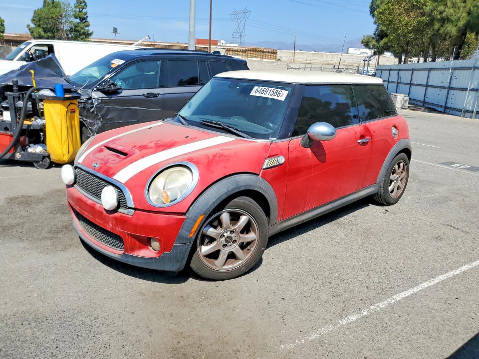 2009 Mini Cooper VIN WMWMF73569TT97366 COPART salvage auction — MINOR DENT/SCRATCHES, Ca - Dis/Dlr/Exp Only Clean Title, sold $300 on 2026-08-18 (photo 1)