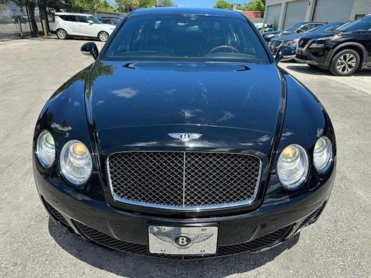 2013 Bentley Continental VIN SCBBP9ZA8DC078165 COPART salvage auction — MINOR DENT/SCRATCHES, FL - CERT OF TITLE-REBUILT (P), sold $24,900 on 2024-10-15 (photo 5)