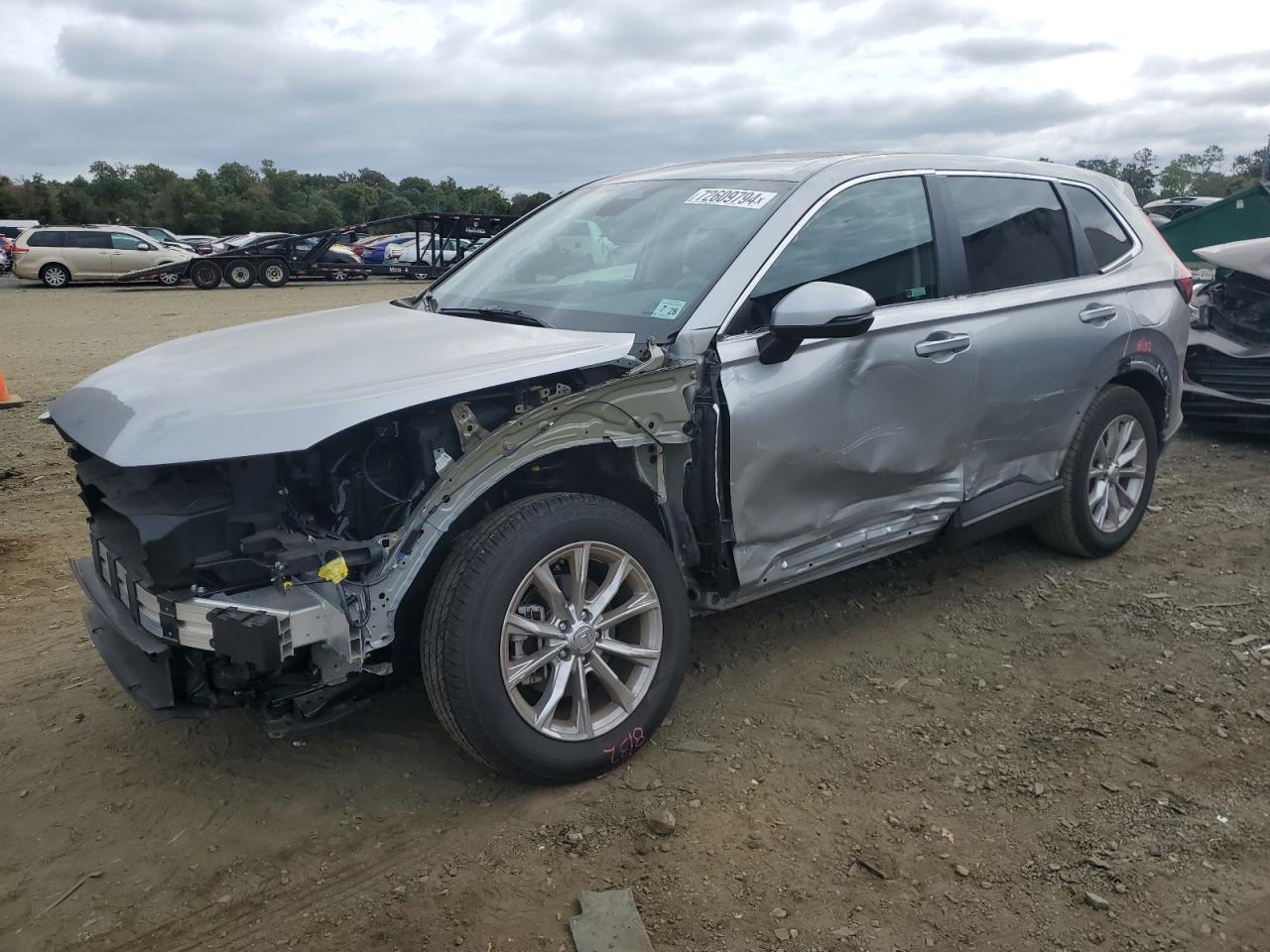2023 HONDA CRV VIN 2HKRS4H79PH440371 — COPART salvage auction photo