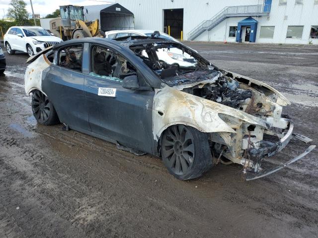 2022 Tesla Model y VIN 7SAYGDEF4NF563776 COPART salvage auction — BURN, Qc - Irrecuperable, sold $125 on 2026-07-28 (photo 4)