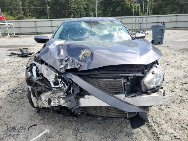 2017 Honda Civic VIN 19XFC2F52HE030541 COPART salvage auction — FRONT END, FL - CERT OF TITLE SLVG REBUILDABLE, sold $1,700 on 2026-10-05 (photo 5)