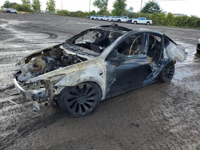2022 Tesla Model y VIN 7SAYGDEF4NF563776 COPART salvage auction — BURN, Qc - Irrecuperable, sold $125 on 2026-07-28 (photo 1)