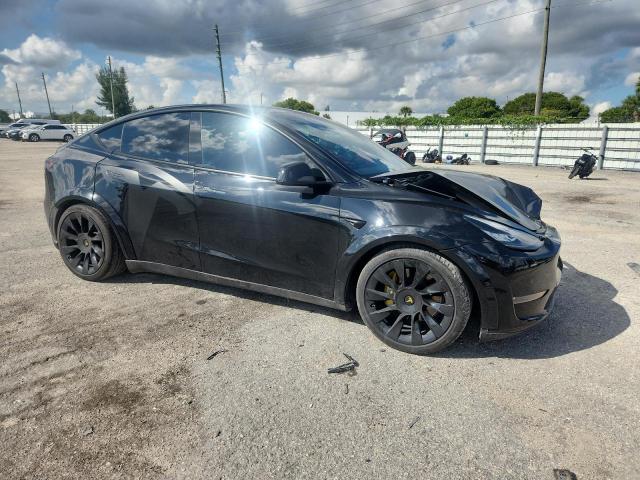 2021 Tesla Model y VIN 5YJYGDEE0MF076576 COPART salvage auction — FRONT END, Fl - Certificate Of Destruction, sold $7,600 on 2026-07-27 (photo 4)