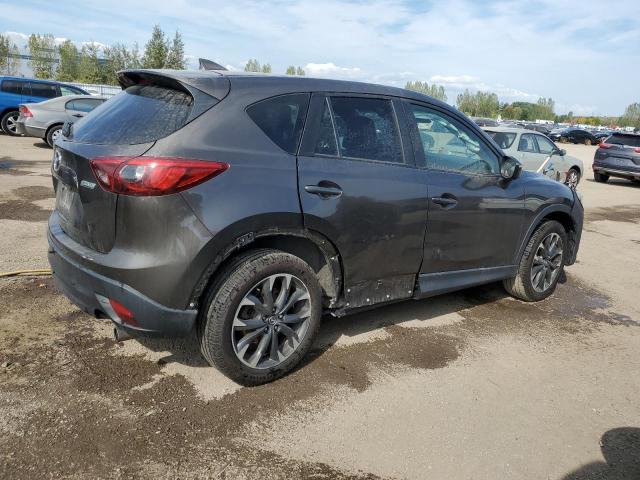 2016 Mazda Cx-5 VIN JM3KE4DYXG0828916 COPART salvage auction — SIDE, Salvage Title, sold $3,050 on 2026-07-27 (photo 3)