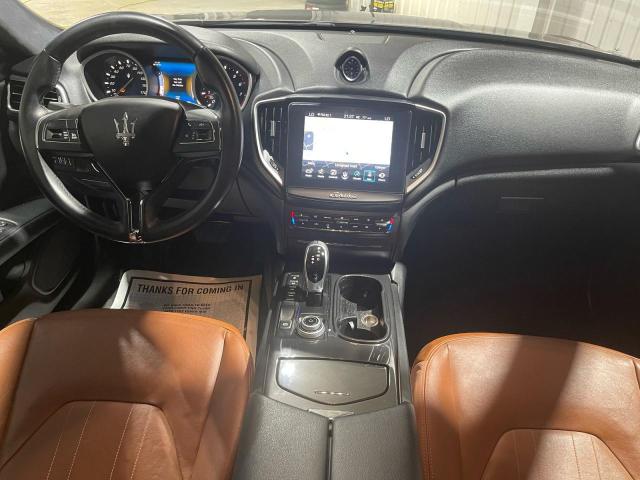 2017 Maserati Ghibli VIN ZAM57XSA9H1206127 COPART salvage auction — Damage History, TX - CERT OF TITLE-REBUILT SALVAGE (P), sold $32,500 on 2025-10-10 (photo 9)