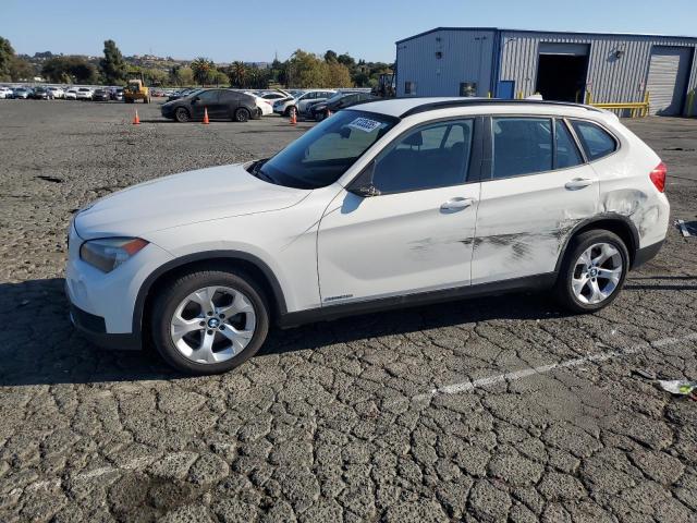 2014 BMW X1 VIN WBAVM1C51EVW49045 COPART salvage auction — Side, CA - DIS/DLR/EXP ONLY CLEAN TITLE, sold $2,000 on 2025-10-10 (photo 1)