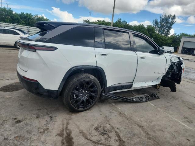 2025 Jeep Wagoneer VIN 3C4RJNAK5ST563584 COPART salvage auction — Side, FL - CERT OF TITLE SLVG REBUILDABLE, sold $16,900 on 2025-12-17 (photo 3)