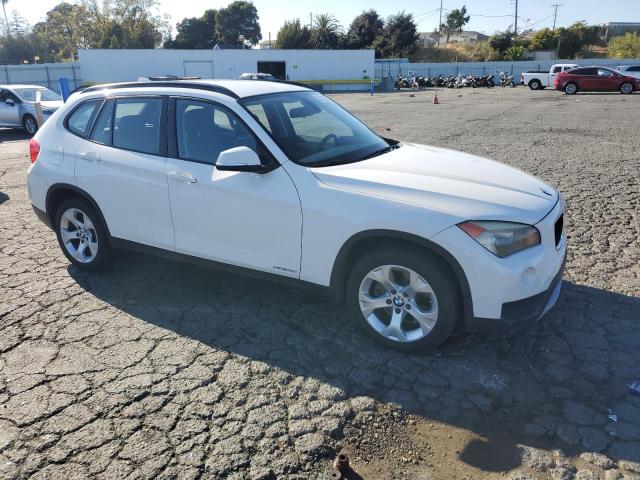 2014 BMW X1 VIN WBAVM1C51EVW49045 COPART salvage auction — Side, CA - DIS/DLR/EXP ONLY CLEAN TITLE, sold $2,000 on 2025-10-10 (photo 4)