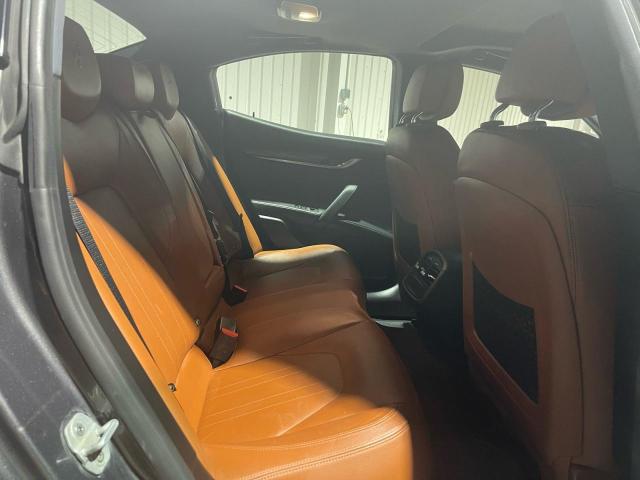 2017 Maserati Ghibli VIN ZAM57XSA9H1206127 COPART salvage auction — Damage History, TX - CERT OF TITLE-REBUILT SALVAGE (P), sold $32,500 on 2025-10-10 (photo 6)