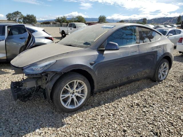 2023 Tesla Model y VIN 7SAYGDEE8PA153084 COPART salvage auction — FRONT END, Ca - Salvage Certificate, sold $60 on 2026-07-21 (photo 1)