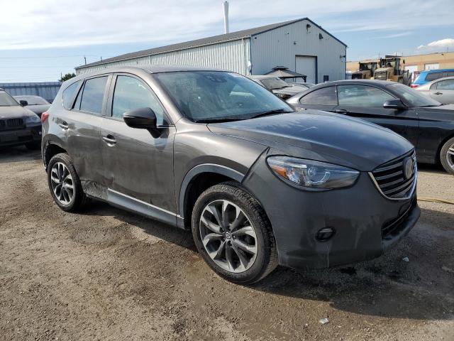 2016 Mazda Cx-5 VIN JM3KE4DYXG0828916 COPART salvage auction — SIDE, Salvage Title, sold $3,050 on 2026-07-27 (photo 4)