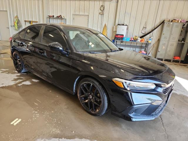 2023 Honda Civic VIN 2HGFE2F5XPH501320 COPART salvage auction — WATER/FLOOD, Wi - Cert Of Title-Salvage & Flood, sold $250 on 2026-07-20 (photo 4)