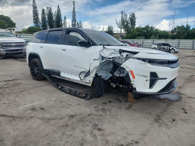 2025 Jeep Wagoneer VIN 3C4RJNAK5ST563584 COPART salvage auction — Side, FL - CERT OF TITLE SLVG REBUILDABLE, sold $16,900 on 2025-12-17 (photo 4)