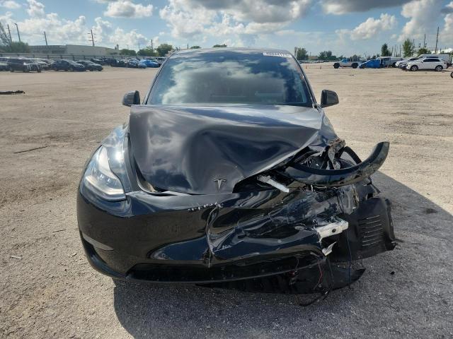 2021 Tesla Model y VIN 5YJYGDEE0MF076576 COPART salvage auction — FRONT END, Fl - Certificate Of Destruction, sold $7,600 on 2026-07-27 (photo 5)