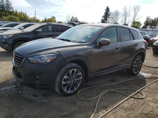 2016 Mazda Cx-5 VIN JM3KE4DYXG0828916 COPART salvage auction — SIDE, Salvage Title, sold $3,050 on 2026-07-27 (photo 1)