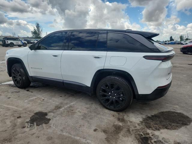 2025 Jeep Wagoneer VIN 3C4RJNAK5ST563584 COPART salvage auction — Side, FL - CERT OF TITLE SLVG REBUILDABLE, sold $16,900 on 2025-12-17 (photo 2)