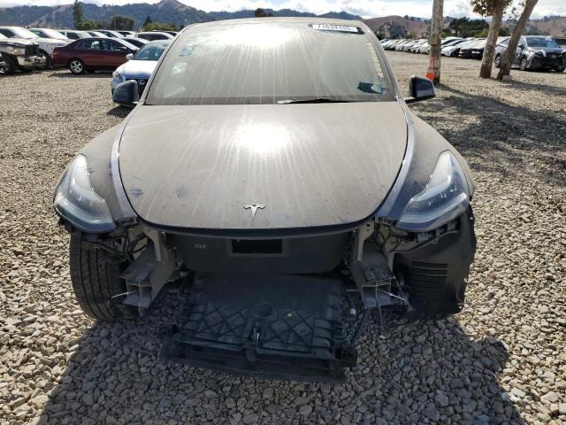 2023 Tesla Model y VIN 7SAYGDEE8PA153084 COPART salvage auction — FRONT END, Ca - Salvage Certificate, sold $60 on 2026-07-21 (photo 5)
