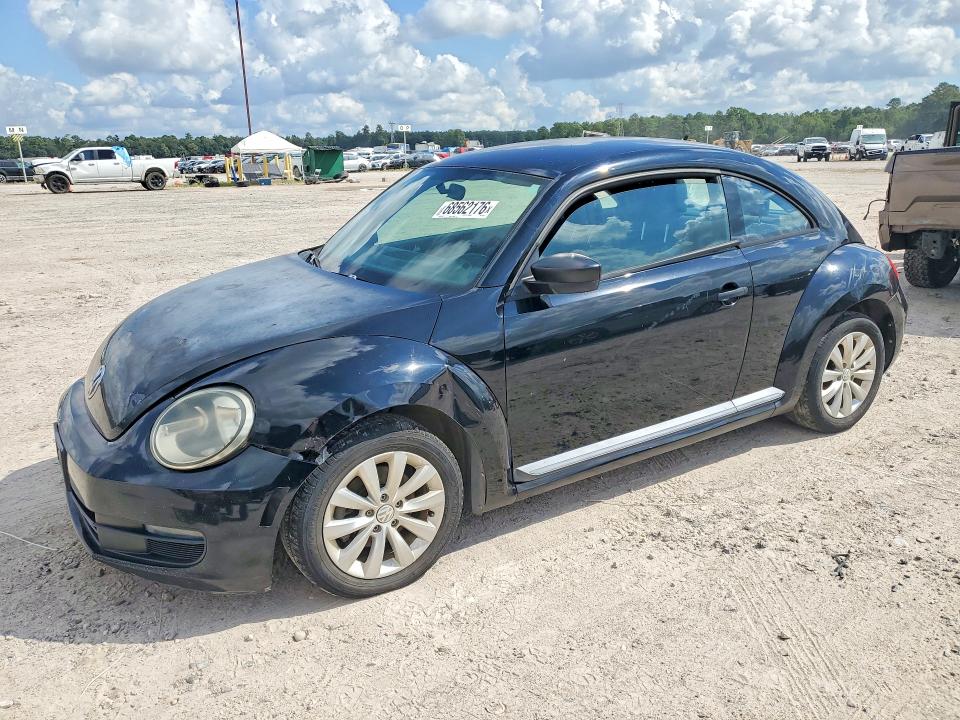 2013 Volkswagen Beetle VIN 3VWFP7AT0DM659350 COPART salvage auction — NORMAL WEAR, Mt - Certificate Of Title, sold $200 on 2026-10-10 (photo 1)