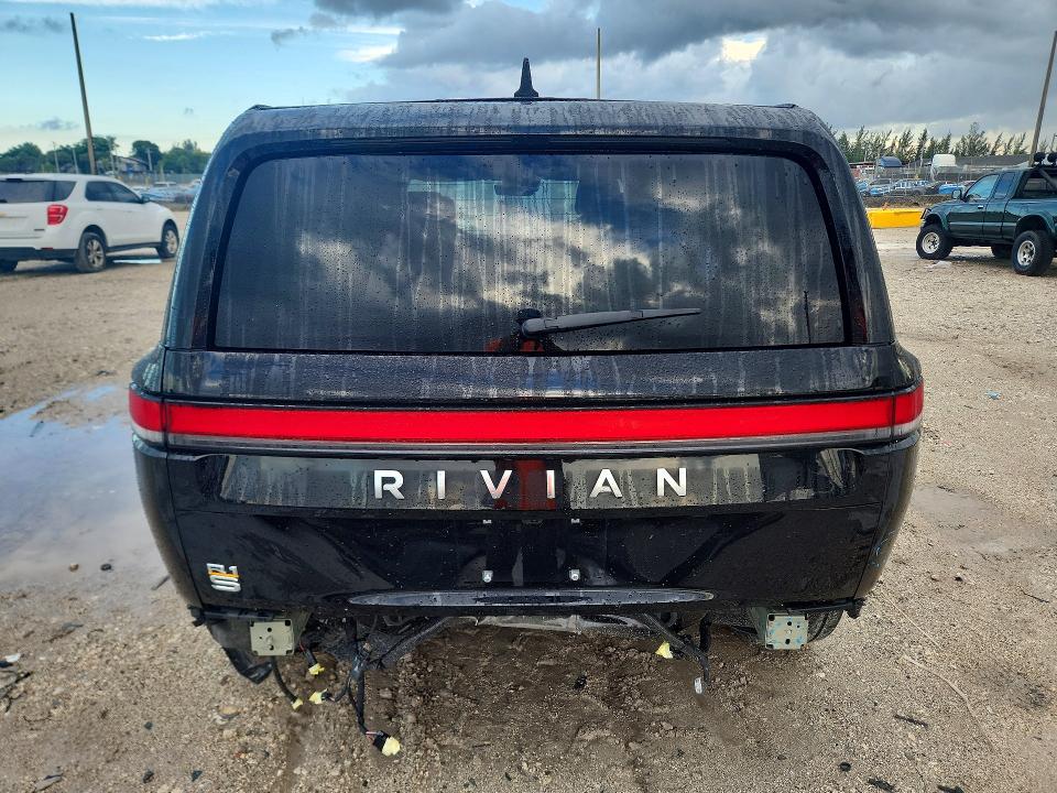 2023 Rivian R1s VIN 7PDSGABA7PN003807 COPART salvage auction — REAR END, FL - CERT OF TITLE SLVG REBUILDABLE, sold $22,600 on 2026-09-22 (photo 6)