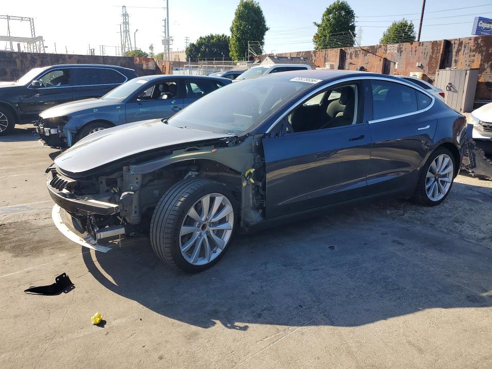 2018 Tesla Model 3 VIN 5YJ3E1EA9JF011992 — COPART salvage auction photo